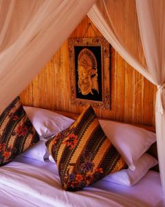 Postel nebo postele na pokoji v ubytování Kidem Ubud Villas