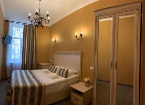 Łóżko lub łóżka w pokoju w obiekcie Residence Moika River