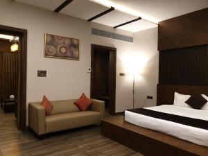 Rúm í herbergi á D Wayfarer Inn Resort