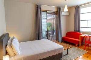 Postel nebo postele na pokoji v ubytování Dive Hotel