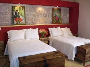 Tempat tidur dalam kamar di Casa Limonchelo Hotel B&B