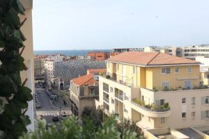 a view of a city with buildings and a street at Le Grand Joliette Marseille "experience-immo" in Marseille