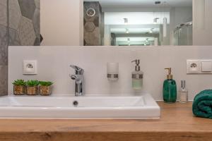 Kúpeľňa v ubytovaní 3D KOSCIUSZKI 19 Apartament + 15 fotografií