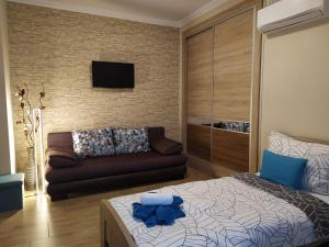 Posteľ alebo postele v izbe v ubytovaní Silver Apartman