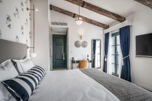 Postel nebo postele na pokoji v ubytování Zamarin Hotel & Spa