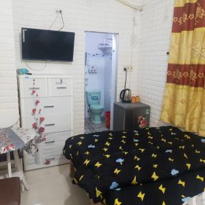 Ліжко або ліжка в номері Tuấn Anh Motel