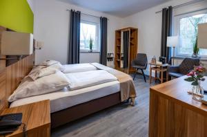 Postel nebo postele na pokoji v ubytování Balkes Morhoff + 36 fotografií