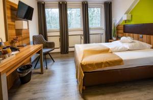 Postel nebo postele na pokoji v ubytování Balkes Morhoff