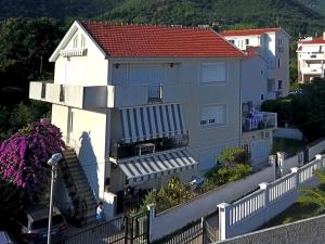 an aerial view of a house with a red roof at Apartments Pean in Tivat