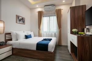 Postelja oz. postelje v sobi nastanitve Patel Hotel Hanoi