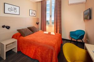 Ένα ή περισσότερα κρεβάτια σε δωμάτιο στο Hotel Miramar