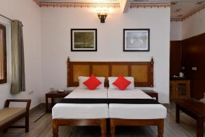 Postel nebo postele na pokoji v ubytování Hotel Sunbird
