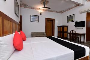 Postel nebo postele na pokoji v ubytování Hotel Sunbird