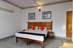 Postel nebo postele na pokoji v ubytování Hotel Sunbird
