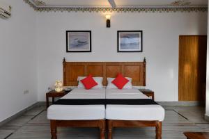 Postel nebo postele na pokoji v ubytování Hotel Sunbird