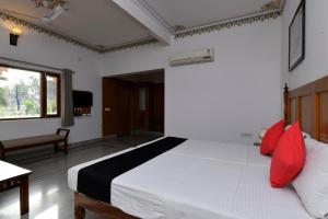 Postel nebo postele na pokoji v ubytování Hotel Sunbird