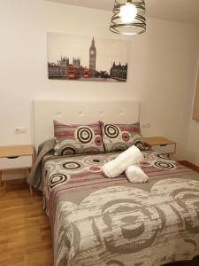 Posteľ alebo postele v izbe v ubytovaní Slow House Sarria