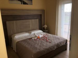 A bed or beds in a room at Cataleya Resort & Spa