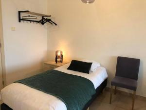 Ένα ή περισσότερα κρεβάτια σε δωμάτιο στο Apartment Fruithof Tack