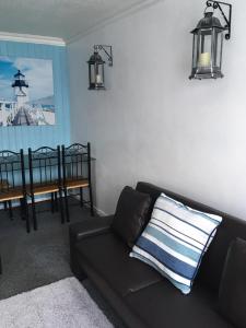 Posezení v ubytování 185 Belle Aire, Beach Road, Hemsby, Norfolk, NR29 4HZ