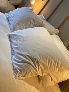 Ein Bett oder Betten in einem Zimmer der Unterkunft Lodge at Tap Haus
