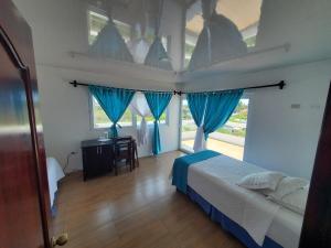 Voodi või voodid majutusasutuse Hotel Cally toas