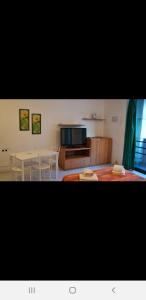 Postel nebo postele na pokoji v ubytování Caravaggio Apartments
