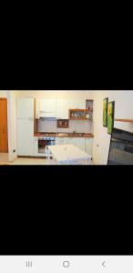 Kuchyň nebo kuchyňský kout v ubytování Caravaggio Apartments