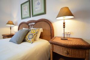 A bed or beds in a room at Las Eras - La casa frente al mar