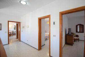 A television and/or entertainment centre at Las Eras - La casa frente al mar