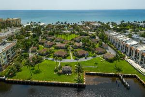 an aerial view of a resort on the water at Ocean Side Resort - updated Villa in Hillsboro Beach