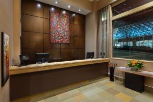 The lobby or reception area at Executive Hotel Pacific