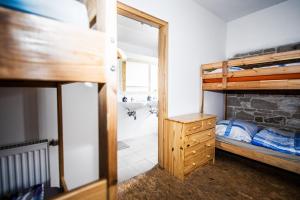 Postel nebo postele na pokoji v ubytování Statek Luníkov