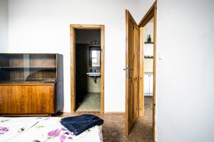Postel nebo postele na pokoji v ubytování Statek Luníkov