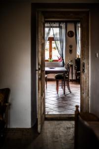 Postel nebo postele na pokoji v ubytování Statek Luníkov