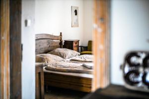 Postel nebo postele na pokoji v ubytování Statek Luníkov