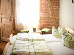 Ένα ή περισσότερα κρεβάτια σε δωμάτιο στο Forsthaus Leiner Berg