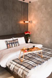 Ліжко або ліжка в номері Style Стильні апартаменти в ЖК "Варшавський" біля парку