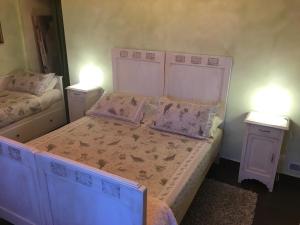 Postel nebo postele na pokoji v ubytování Dimora del Riccio
