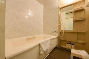 Koupelna v ubytování Aiwa no Mori Hotel