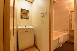 Koupelna v ubytování Aiwa no Mori Hotel