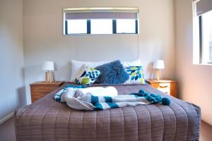Ein Bett oder Betten in einem Zimmer der Unterkunft Station Lodge