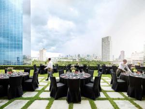 a banquet set up on the roof of a building at SO/ Bangkok in Bangkok
