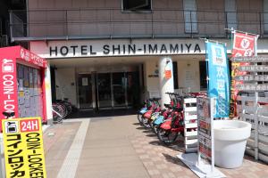 
motorcycles parked in front of a store at Hotel Shin-Imamiya in Osaka

