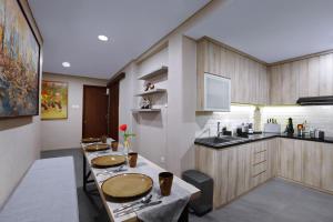 Cucina o angolo cottura di S7 SUITES GANDARIA