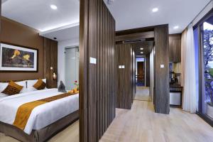 Postel nebo postele na pokoji v ubytování S7 SUITES GANDARIA + 28 fotografií