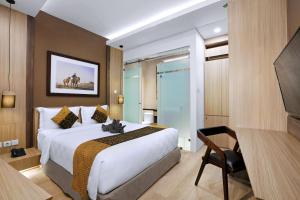 Letto o letti in una camera di S7 SUITES GANDARIA