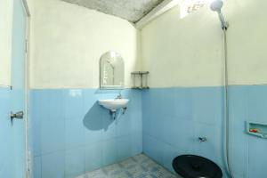 Salle de bains dans l'établissement Jemakir Homestay