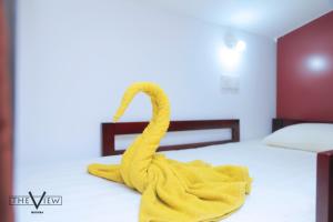 Una cama o camas en una habitación de The View Mirissa