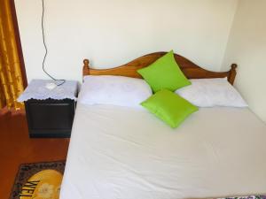 Postel nebo postele na pokoji v ubytování Diwanka Villa